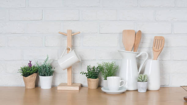 istock Kitchen utensils and dishware on wooden shelf. Kitchen interior background.Text space. 1019895100