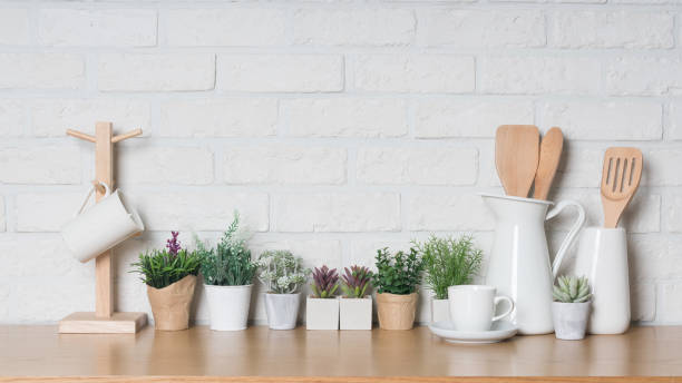 istock Kitchen utensils and dishware on wooden shelf. Kitchen interior background.Text space. 1019895190