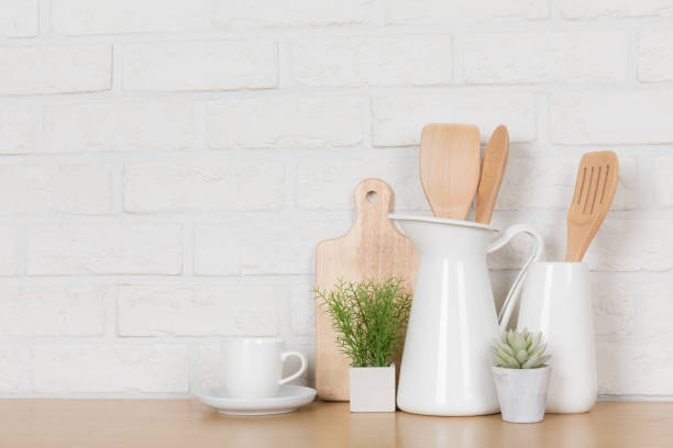 istock Kitchen utensils and dishware on wooden shelf. Kitchen interior background.Text space. 1019895320