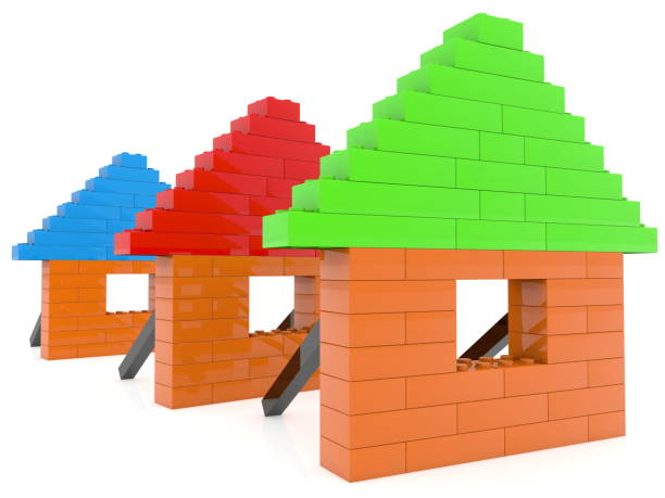 istock Toy bricks houses in row on white 1019902538