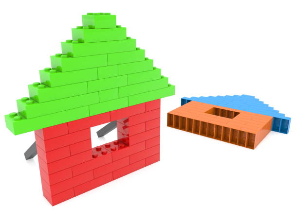 istock Toy bricks house with green roof 1019902658
