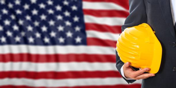 istock Engineer on a USA flag background. 3d illustration 1019902734