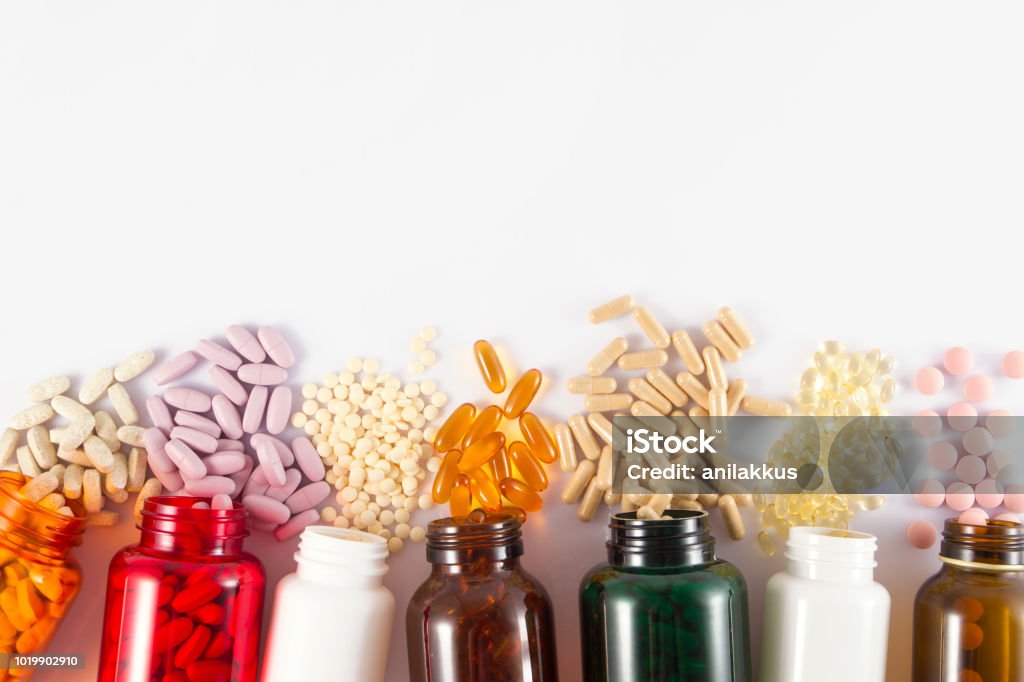 Sfondo pillole - Foto stock royalty-free di Integratore vitaminico