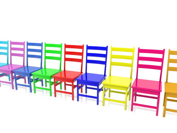 istock Row of chairs in various colors on white 1019908162