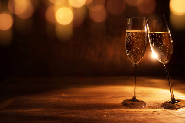 istock Golden christmas background with champagne 1019913034