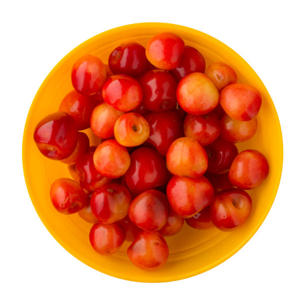 istock cherry white isolated on a white background. cherry on a plate. healthy food . 1019913604