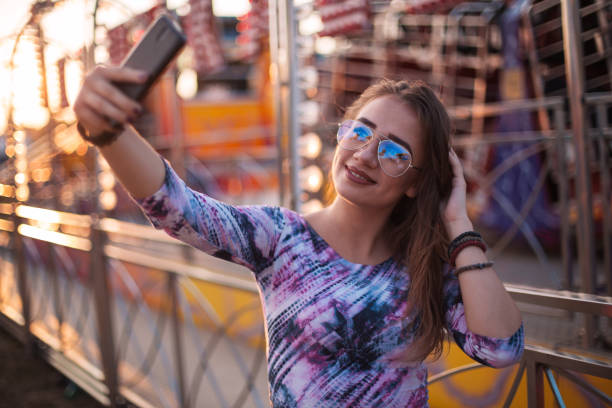 istock Girl at a funfair 1019914814