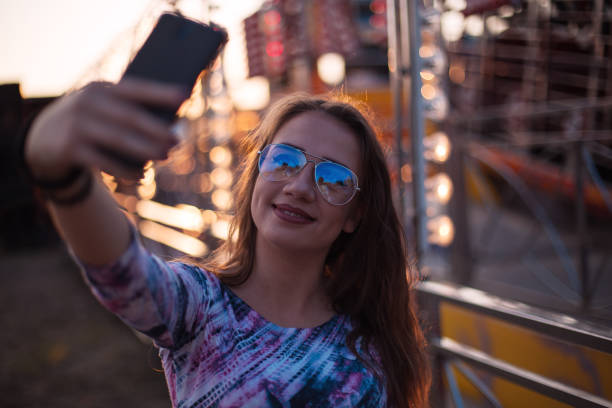 istock Girl at a funfair 1019918126