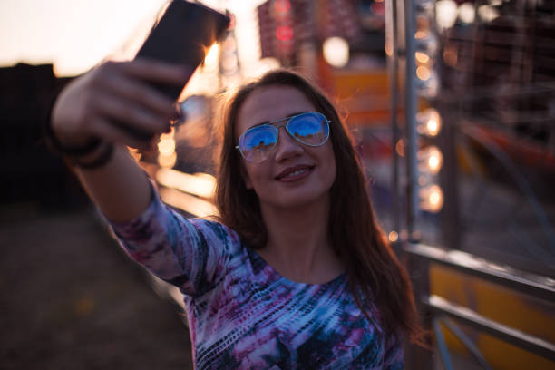 istock Girl at a funfair 1019918412
