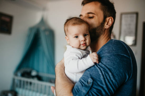 istock Dad soothe crying colic baby 1019927998