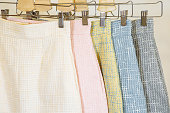 Collection of fashion skirts on the hanger. Clothing store
