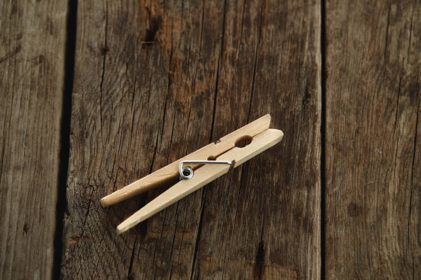 istock Clothespin on wooden table 1019944782
