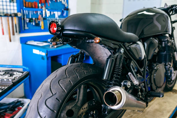 istock Motorcycle workshop with custom motorbike 1019946656