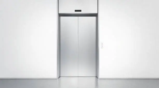 Photo of Blank silver closed elevator in office floor interior mock up