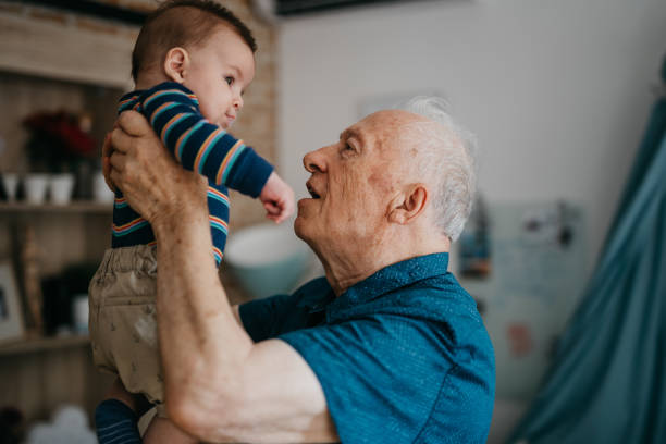 istock Grandfather playing with his grandson 1019949888