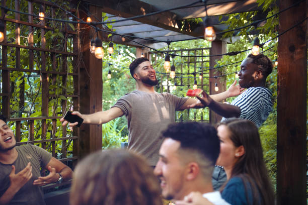 istock Multi-ethnic friends enjoying dinner together 1019966182
