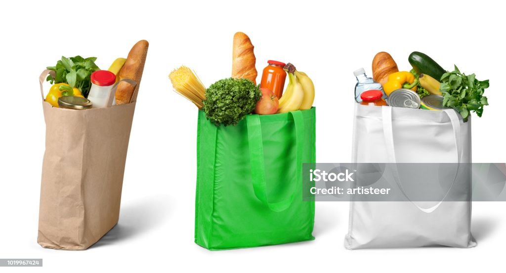 Groceries. Shopping bags with groceries on white Bag Stock Photo