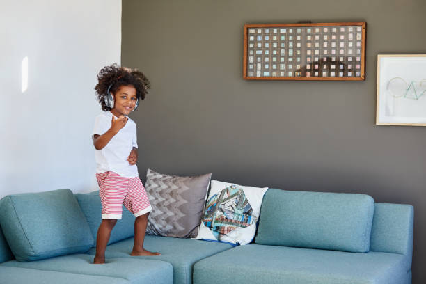 istock I hope mom does't catch me dancing on the couch 1019982180