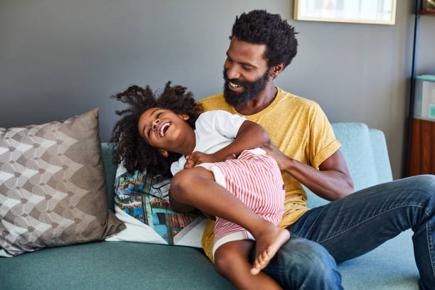 istock Stop it dad, my stomach hurts from laughing! 1019982212