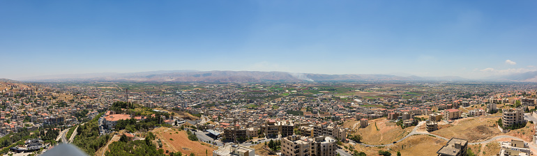 Panorama of the agricultural Bekaa Valley in Lebanon, with Antilebanon mountains in the back, from Zahlé town.