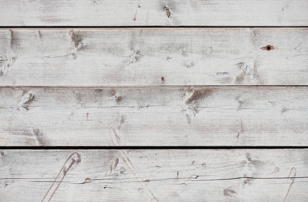 Wooden background HighRes photograph of a weathered wooden boards. knotted wood wood dirty weathered stock pictures, royalty-free photos & images