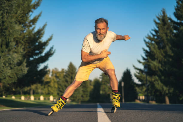 istock The old man rollerblading on the asphalt 1019996268