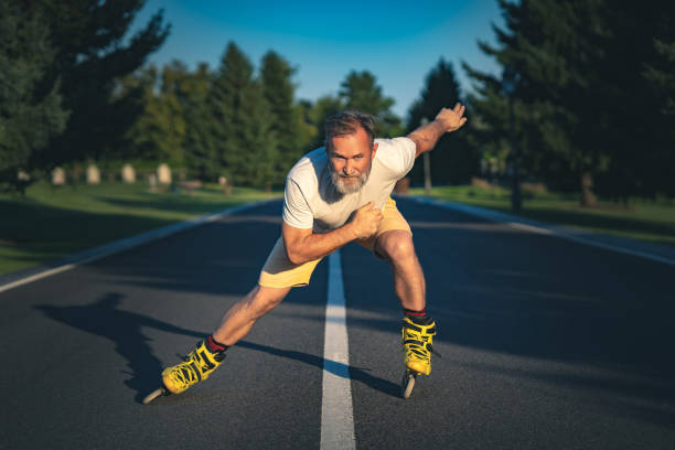istock The old man rollerblading on the asphalt 1019996272