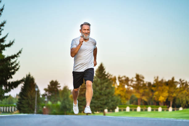istock The elderly man running on the road 1019998696