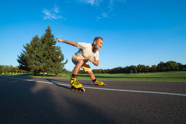 istock The elderly man rollerblading on the asphalt 1019998956