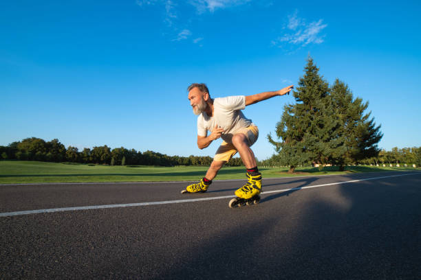 istock The elderly man rollerblading on the alley 1020000820