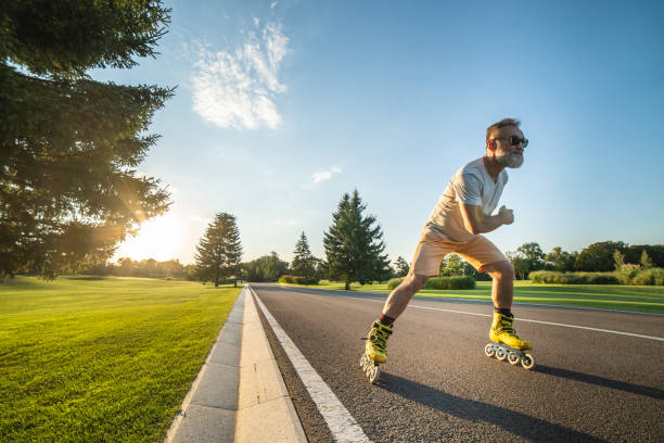 istock The old man in sunglasses rollerblading on the road 1020000880