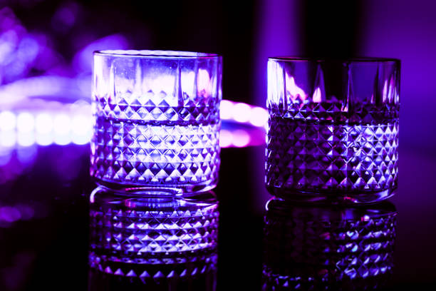 istock bar colored lights with glasses of alcohol 1020010260
