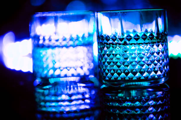 istock bar colored lights with glasses of alcohol 1020010308