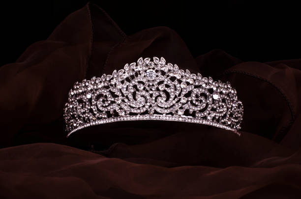istock silver diadem with diamonds isolated on the fabric 1020025998