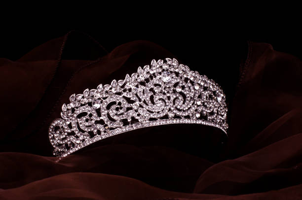 istock silver diadem with diamonds isolated on the fabric 1020026028