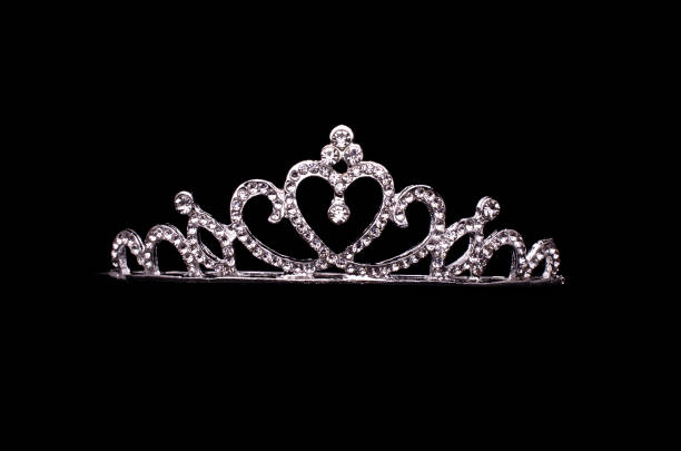 silver diadem with heart and diamonds isolated on white silver crown with heart and diamonds isolated on white princess crown tiara prom stock pictures, royalty-free photos & images