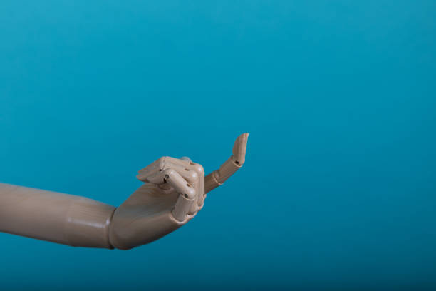 Closeup of male hand pointing. Isolated on light background