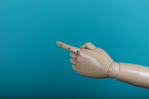 istock Closeup of male hand pointing. Isolated on light background 1020036986