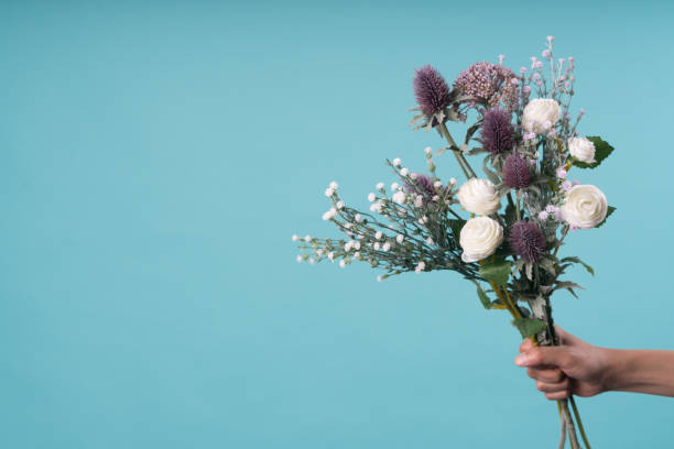 istock wild and beautiful flower bouquet on light background. 1020036992