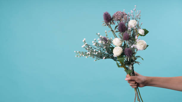 istock wild and beautiful flower bouquet on light background. 1020037038