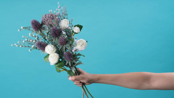 istock wild and beautiful flower bouquet on light background. 1020037296