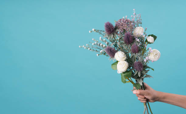 istock wild and beautiful flower bouquet on light background. 1020037310