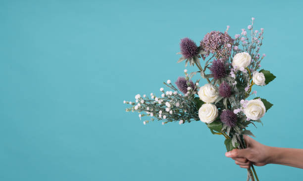 istock wild and beautiful flower bouquet on light background. 1020037326