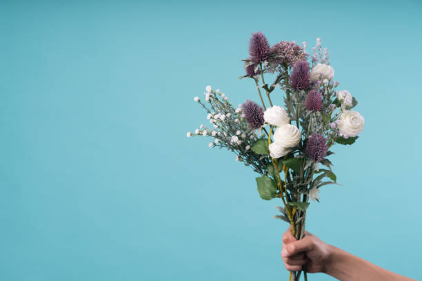 istock wild and beautiful flower bouquet on light background. 1020037332