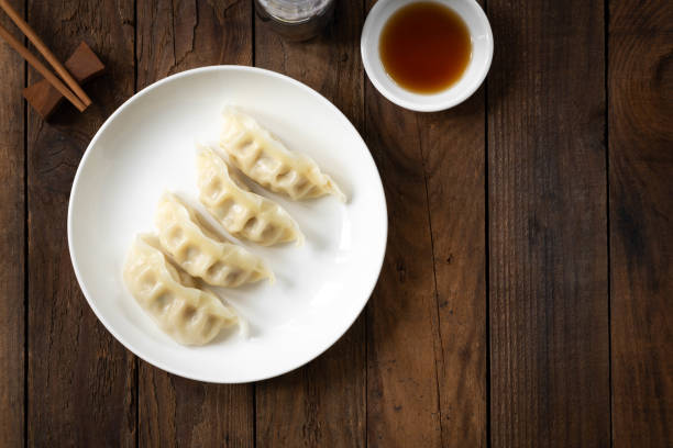 istock Gyoza dumplings on white plate 1020037912