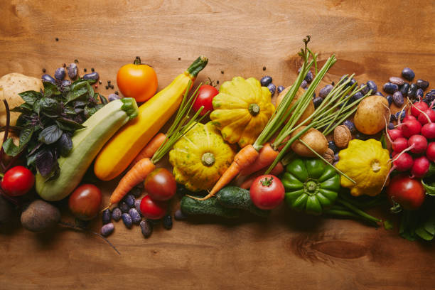 istock Food composition with vegetables and beans on wooden table 1020038024
