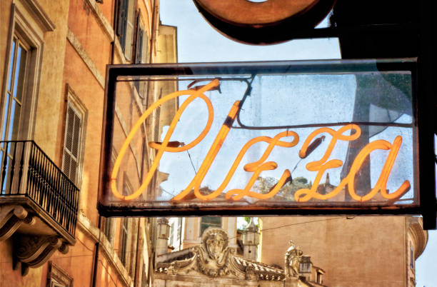 istock Pizzeria sign on ancient buildings 1020040680