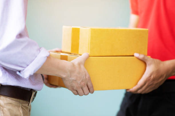 istock parcel delivery man of a package 1020040704
