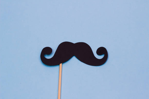 istock Photo booth props black Mustache on blue background 1020040814