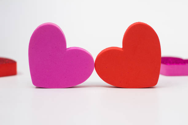 istock Red and pink Hearts on white background 1020040878